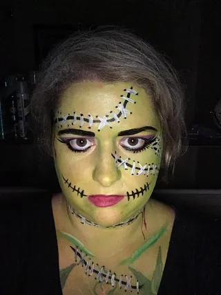 Adult with Frankenstein's monster facepaint